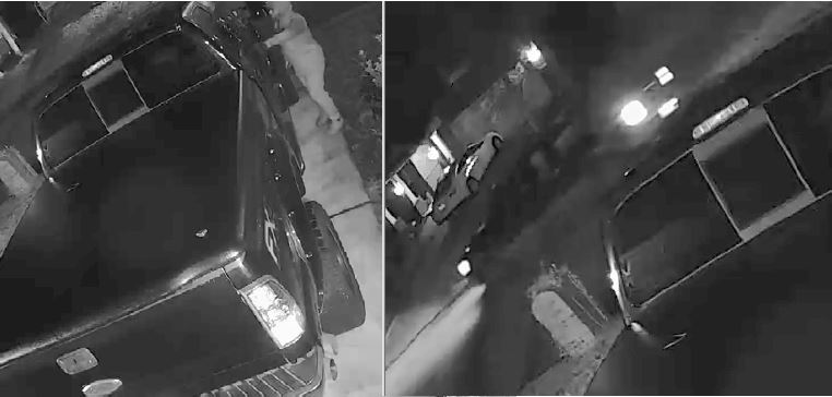 Black and white photo of Ford F250 four-door truck with undescriptive view of suspect